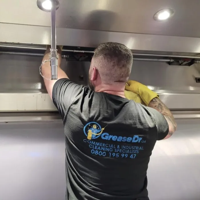 Grease Dr technician cleaning a kitchen extraction system